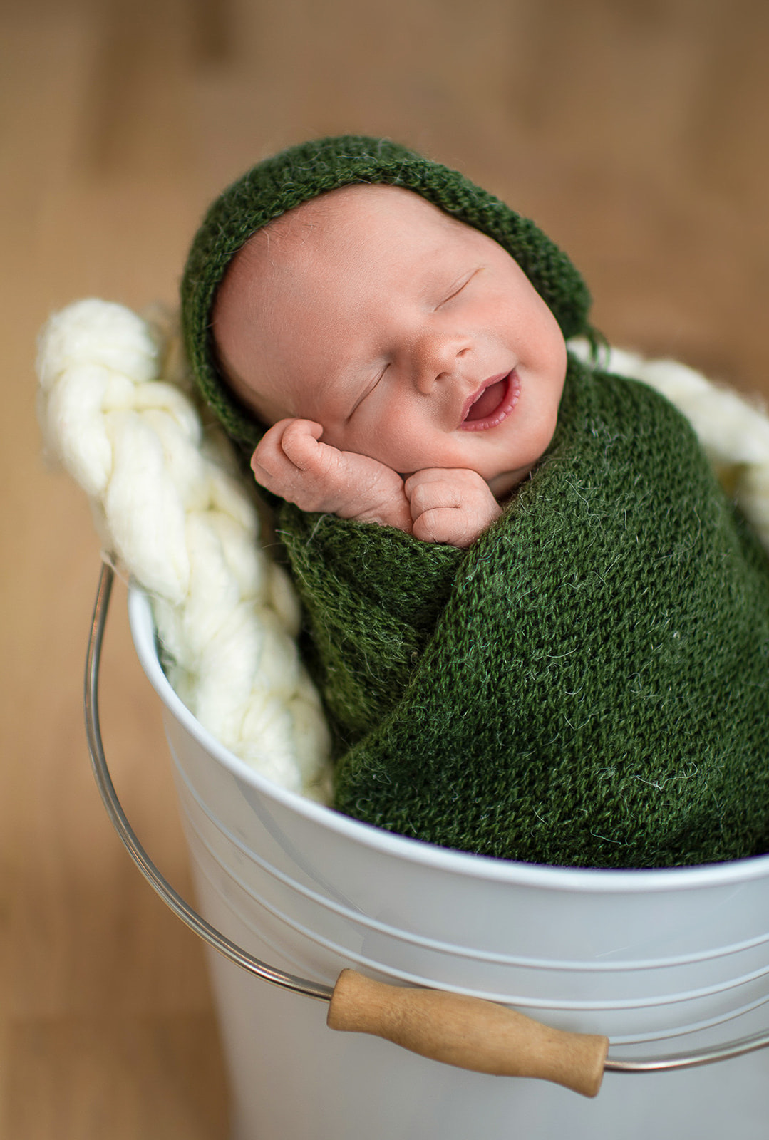 grand rapids newborn photography baby green knit wrap bucket.jpg