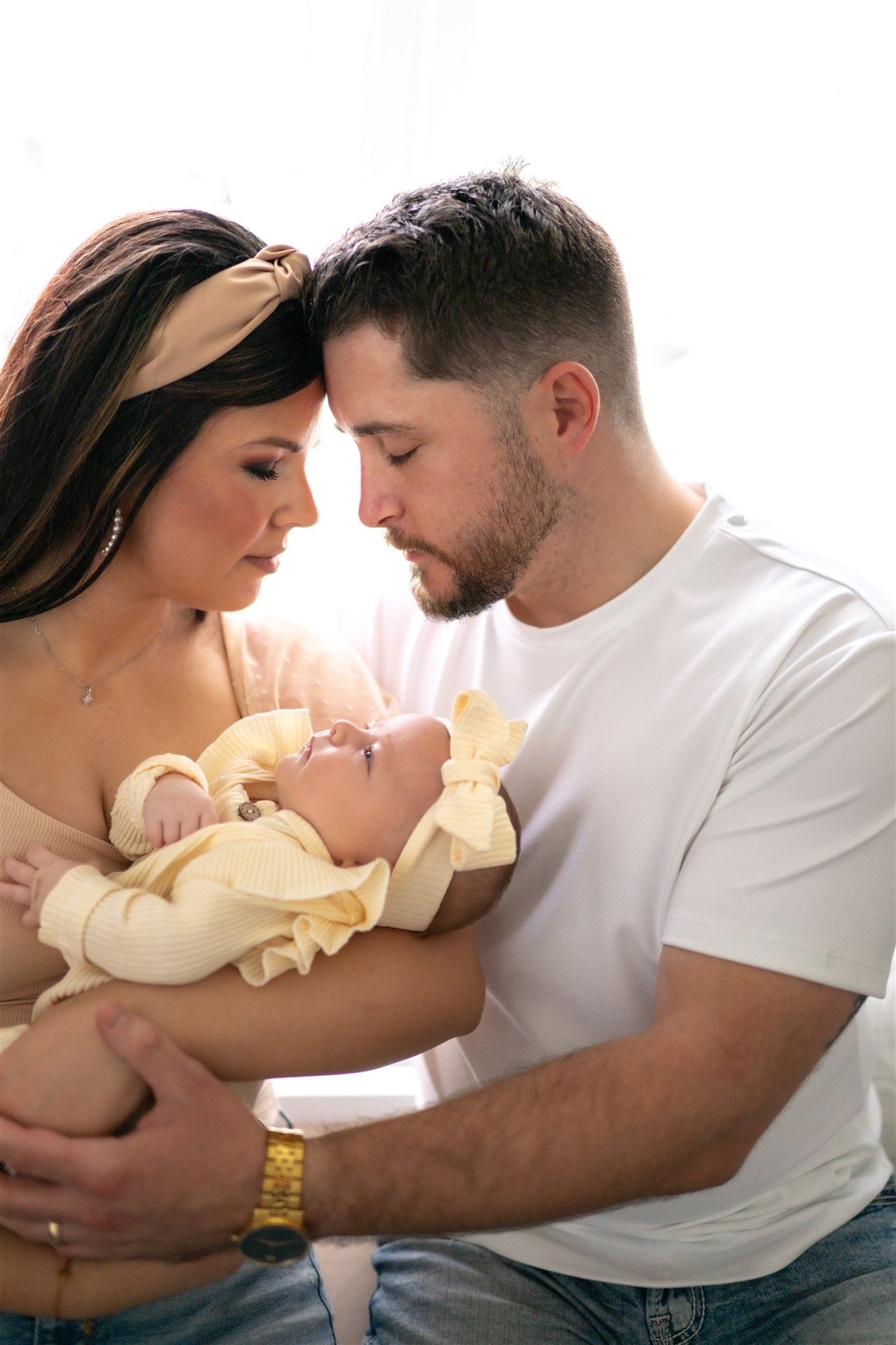 grand rapids newborn photography parents yellow outfit baby